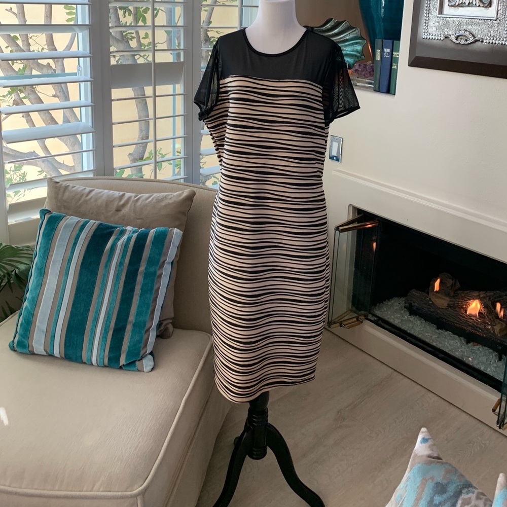 Dress with sheer accents